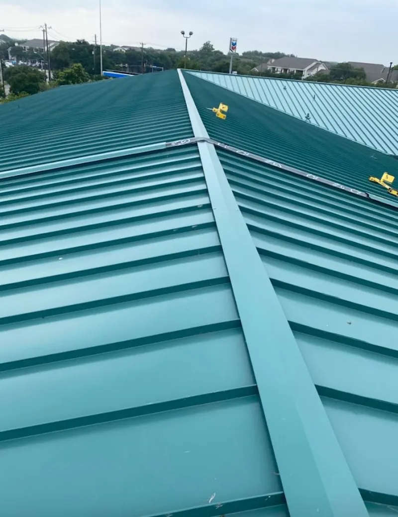 Green commercial metal roof ridge and valley for Metal Roof Repair in Brandon